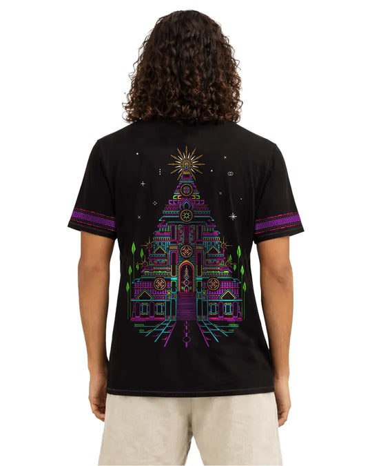 Person wearing a black t-shirt with a colorful geometric design on the back