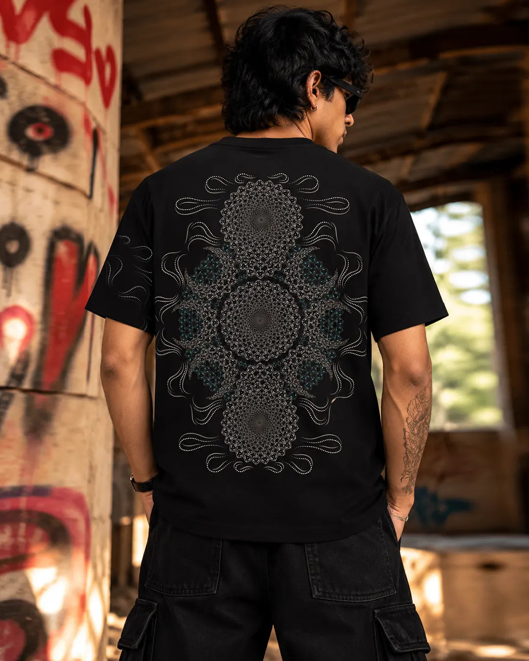 Stellar Oasis glow-in-the-dark regular-fit T-shirt by Ultra Tribe featuring cosmic-inspired graphic artwork.