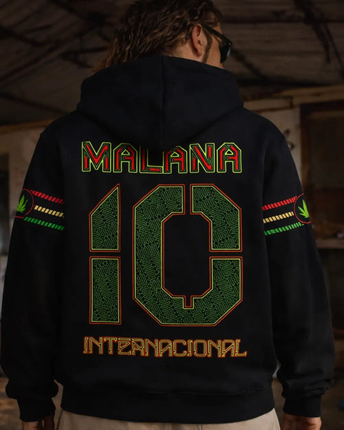 Person wearing a black hoodie with 'MALANA 10 INTERNACIONAL' text on the back.
