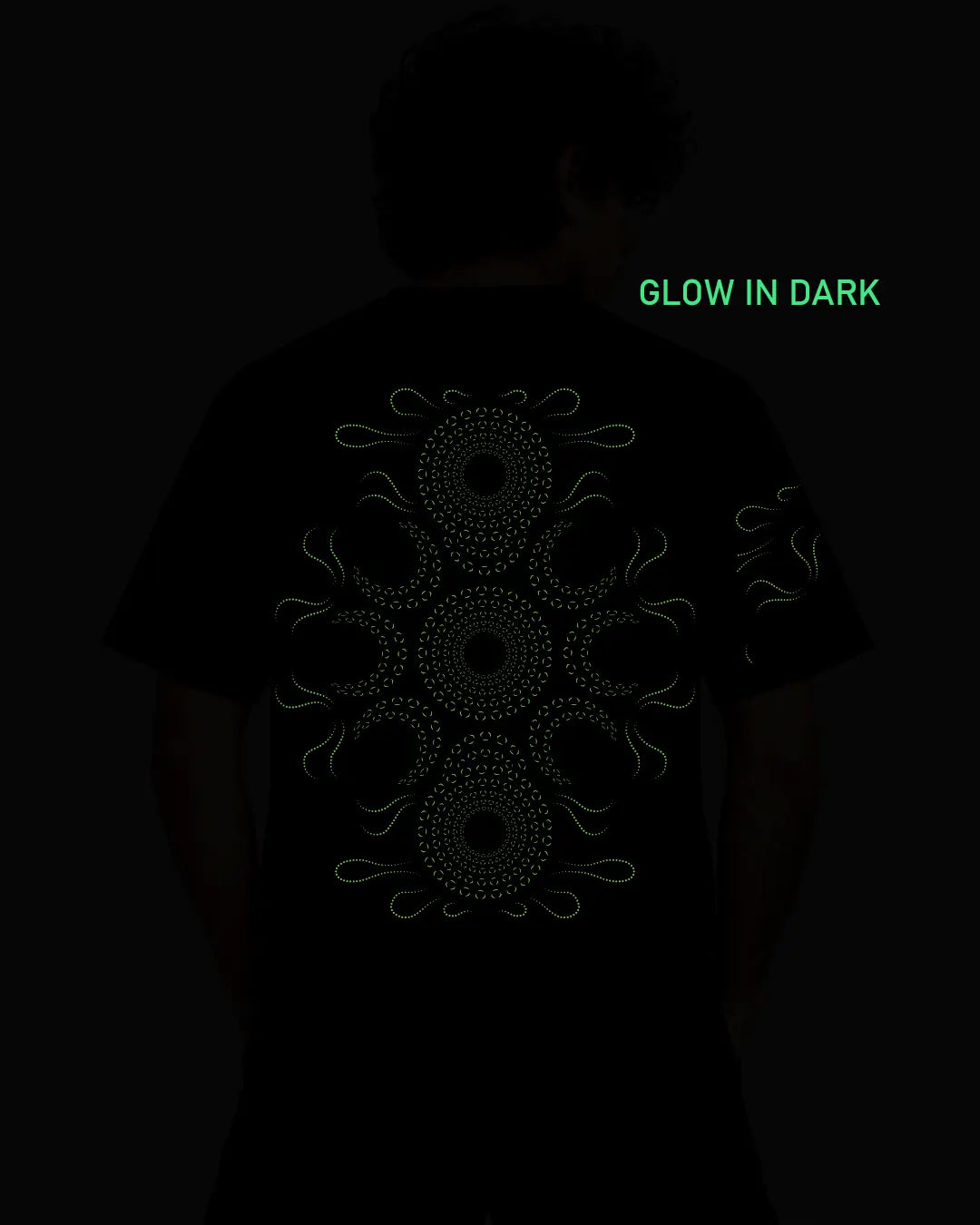 Ultra Tribe Stellar Oasis graphic glow in dark T-shirt showcasing its distinctive psychedelic artwork on a regular-fit cotton tee.