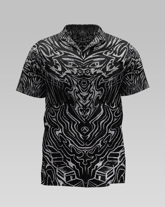 Black and white patterned shirt on a gray background