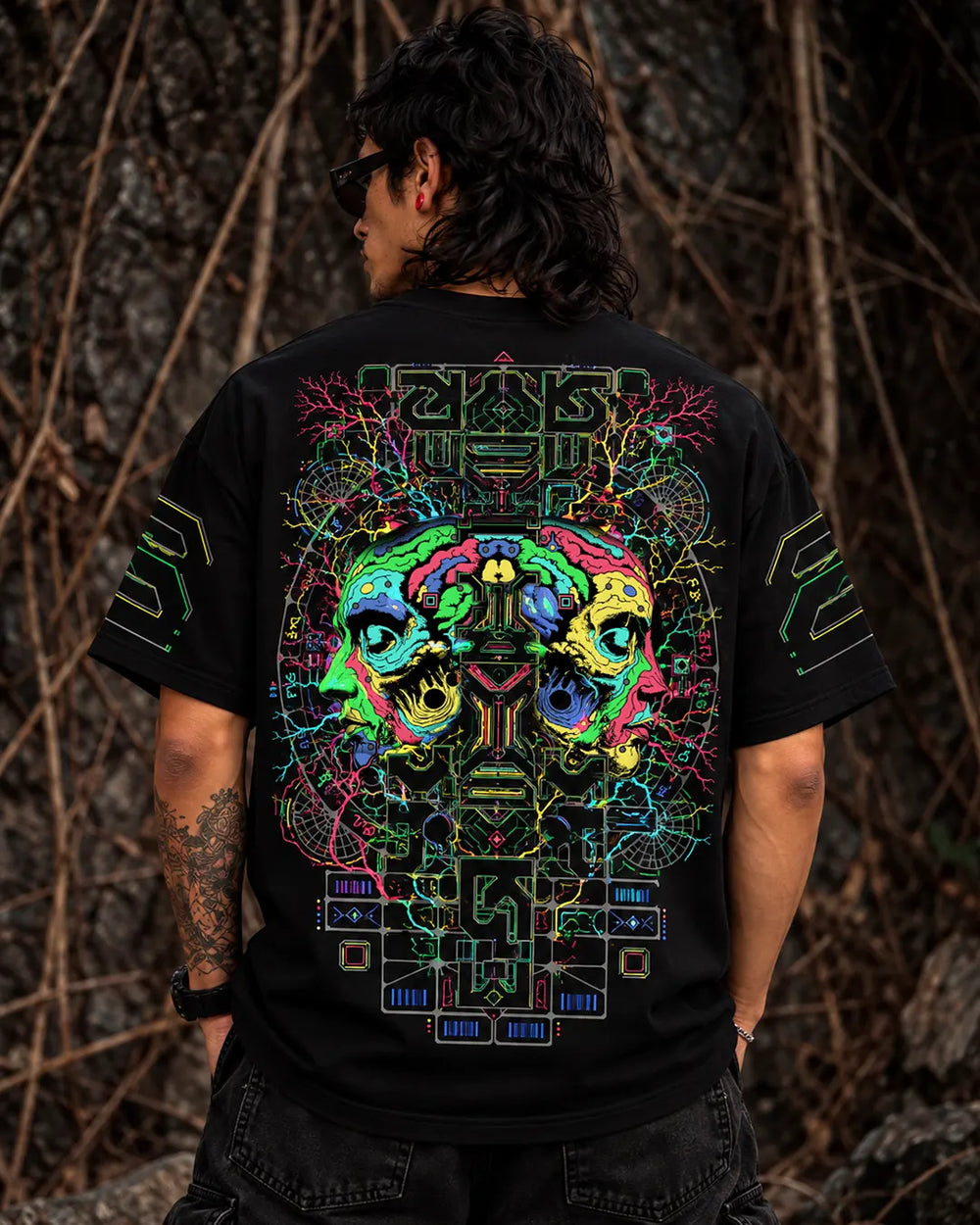 Shop the Retro Neuro UV light reactive oversized T-shirt by Ultra Tribe, featuring expressive artwork that stands out under UV and blacklight.