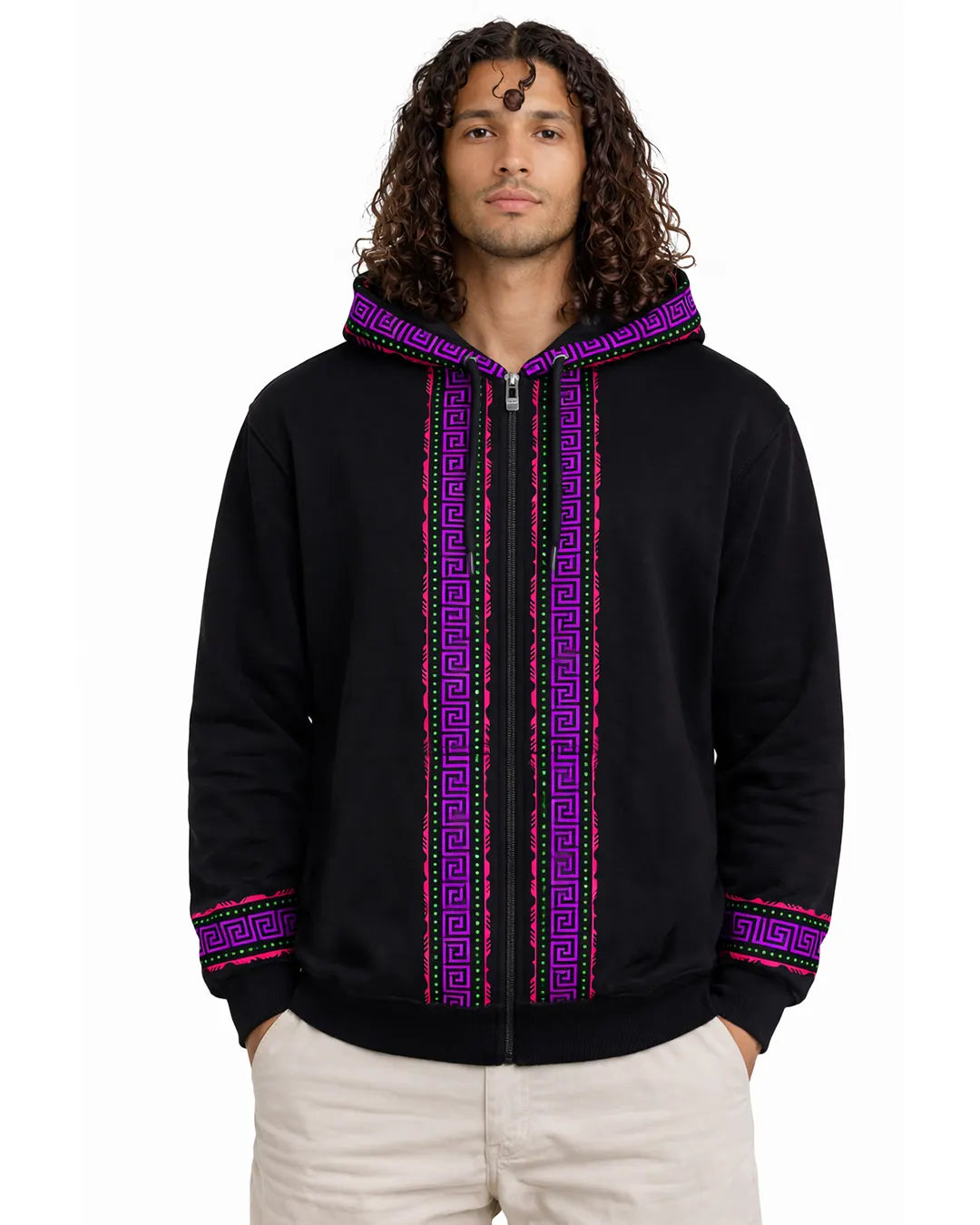 Man wearing a black hoodie with purple and pink patterns on a white background