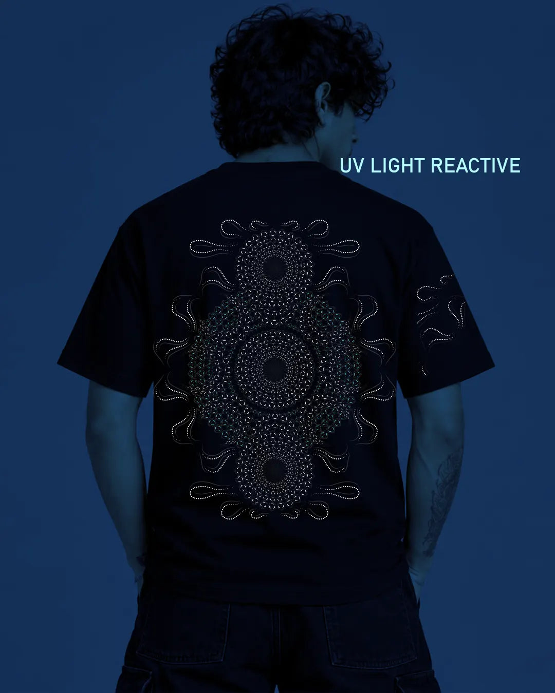 Stellar Oasis glow-in-the-dark regular-fit T-shirt by Ultra Tribe featuring cosmic-inspired graphic artwork.